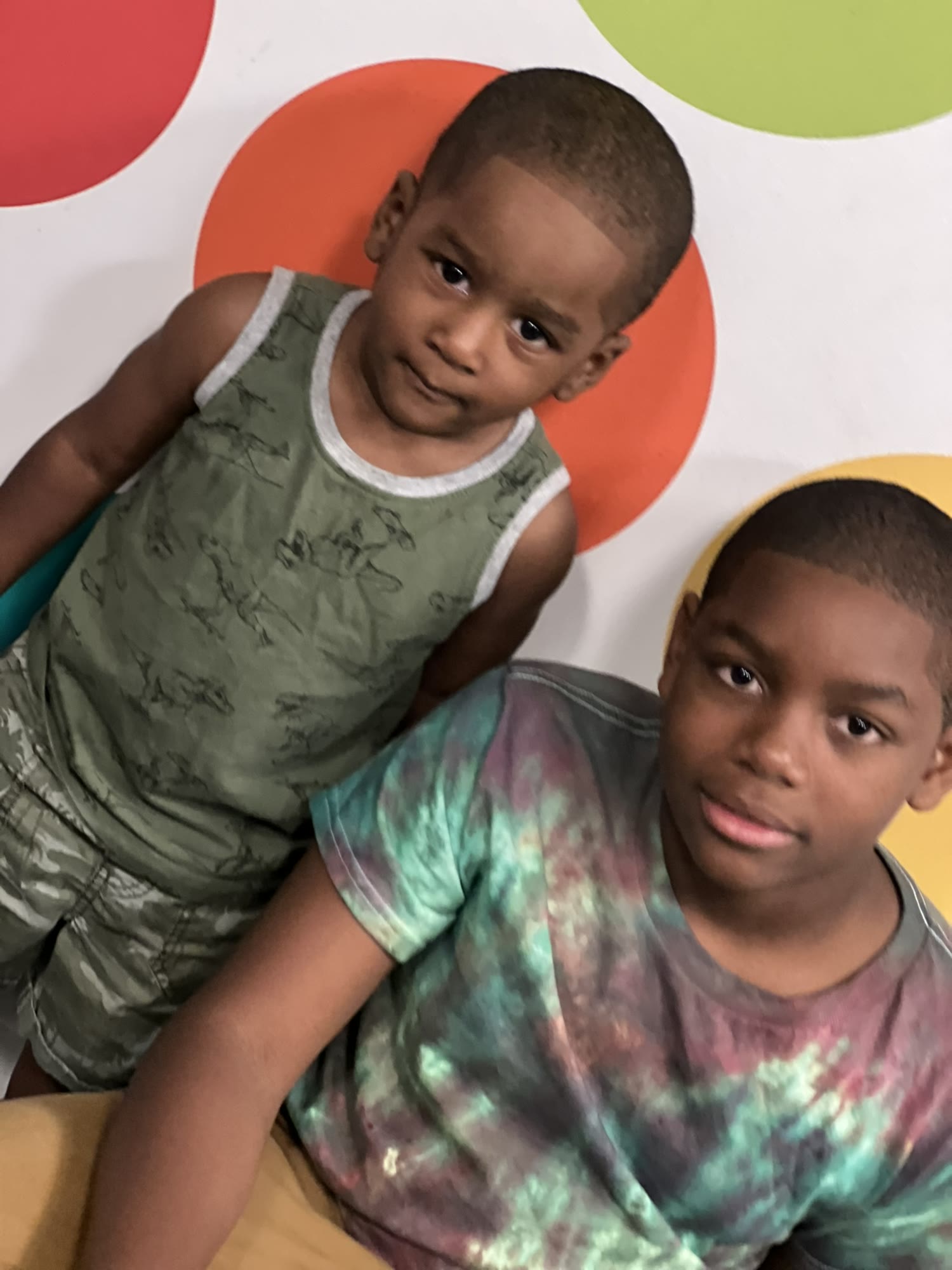 Two boys after their at-home haircuts