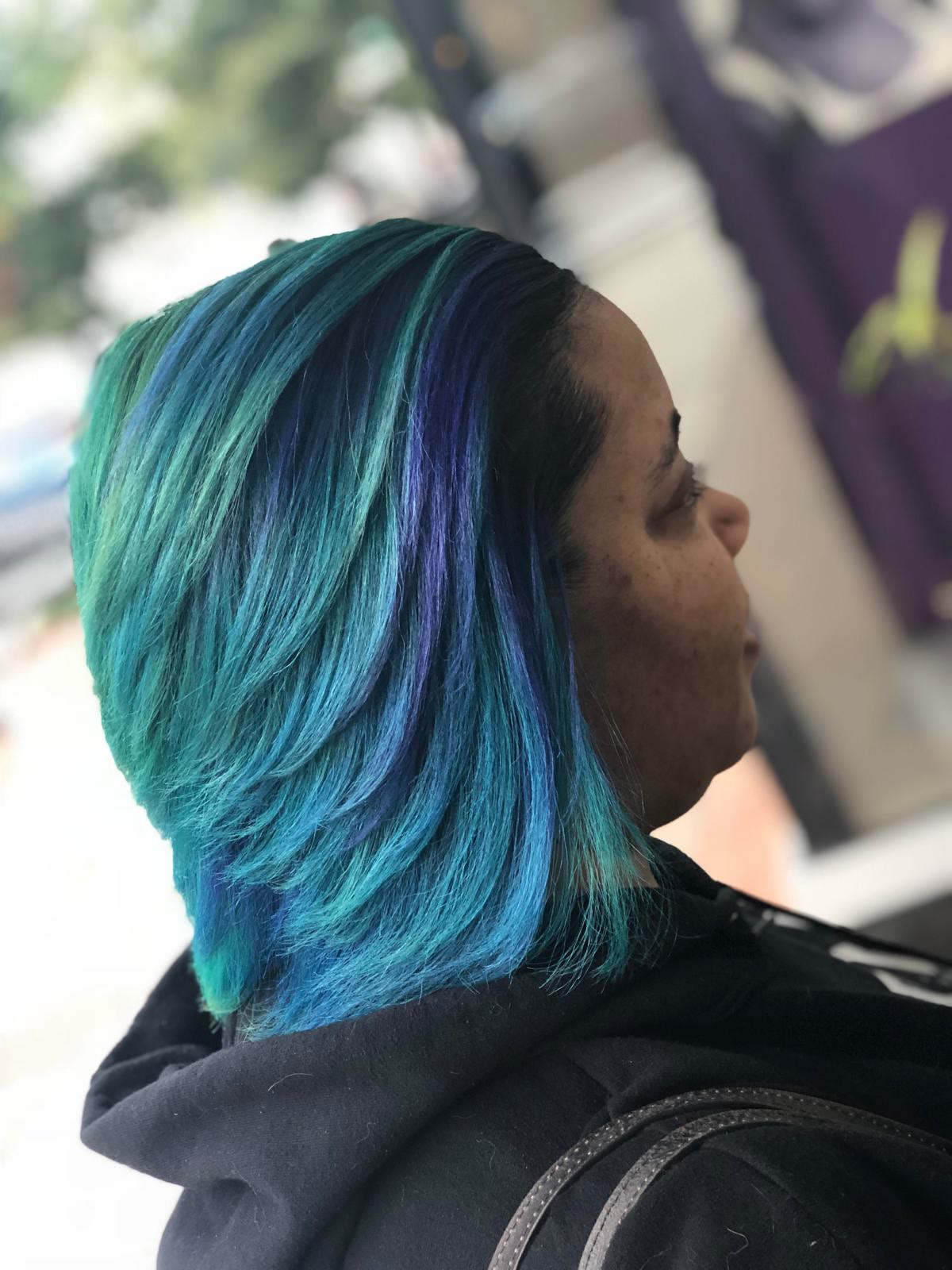 Sleek silk press on teal and violet color
