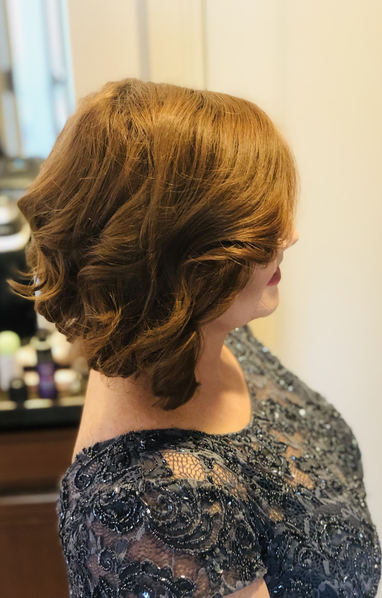 Soft curled bob for a formal event